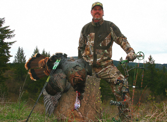 Hunter with Dead Turkey Hunter with Dead Turkey